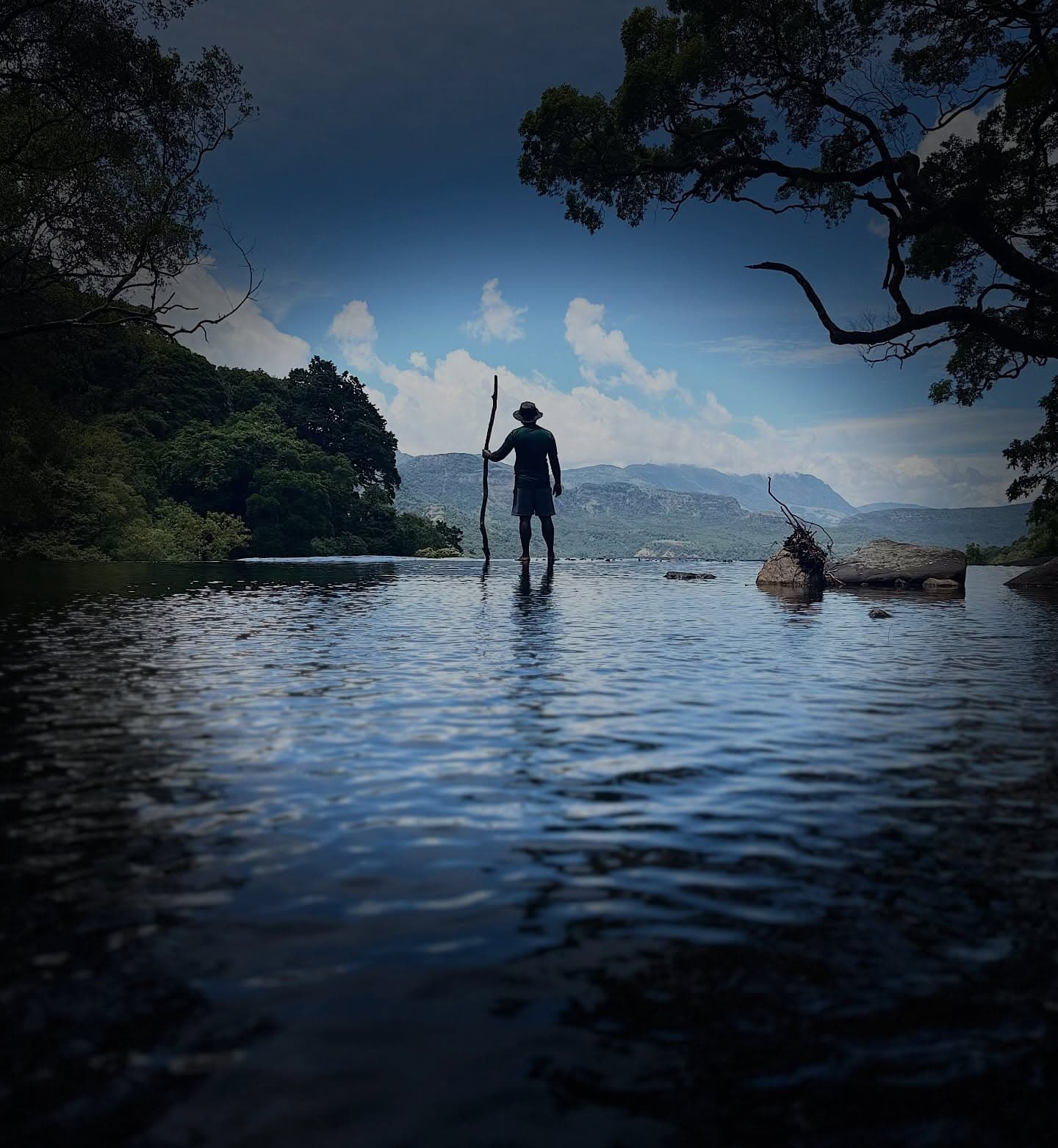 Hikers climbing mountain trail